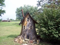 a house made out of a tree stump