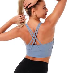 The EMES SHOP sports bra is detailed with a scoop neckline. Features double racerback straps that crossover the open back. This lightweight. breathable. quick-drying sports bra is perfect for your next gym session or yoga class.MATERIAL:85% Nylon 15% SpandexMEASUREMENTS:Small : 4-6 Waist: 25-26.5 in Chest: 33-34.5 in Medium : 6-8 Waist: 26.5-28 in Chest: 34.5-36 in Large : 8-10 Waist: 28-29.5 in Chest: 36-37.5 in X-Large : 10-12 Waist: 29.5-31 in Chest: 37.5-39 in Sporty T-back Crop Top For Workout, Athleisure Strappy Sports Bra With Built-in Bra, T-back Sports Bra With Medium Bust Support For Yoga, T-back Sports Bra With Straps For Workout, Racerback Activewear With Built-in Bra For Light Exercise, Strappy Sports Bra With Built-in Bra, Sports Bra With Strappy Back And Built-in Bra, Gym Activewear With Built-in Bra And Wide Straps, Cross Back Sports Bra With Built-in Bra For Training