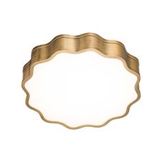 a round light fixture with a gold finish