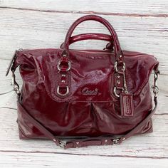 Like New! Don’t Miss Out On This Beautiful Burgundy Purse. The Only Flaw Is Stitching Is Slightly Undone Towards The Top Of An Inner Pocket (Pictured). Side Satchel, Pastel Bags, Coach Bucket Bag, Burgundy Purse, Ashley Black, Leather Duffel Bag, Coach Satchel, Leather Duffel, Patent Leather Handbags