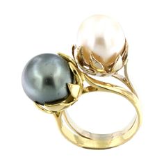 Black and white, beautiful and elegante combination of colours for this timeless ring handmade in Italy by Stanoppi Jewellery since 1948. Ring in 18k white and yellow gold with White Pearl (12 mm) and Tahiti Pearl (12 mm) Size of ring: 14 EU - 7 USA g.13.70 (Possibility to have earrings in set) All Stanoppi Jewelry is new and has never been previously owned or worn. Each item will arrive at your door beautifully gift wrapped in Stanoppi boxes, put inside an elegant pouch or jewel box. Yellow Gold Fine Jewelry Rings With High Luster, Formal Yellow Gold Rings With High Luster, High Luster Yellow Gold Rings For Formal Occasions, Formal High Luster Yellow Gold Rings, Elegant Yellow Gold Rings With High Luster, Exquisite High Luster Rings For Gifts, High Luster White Gold Fine Jewelry Rings, White Gold High Luster Rings For Anniversary, Timeless High Luster Rings For Gift