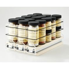 a spice rack with twelve spices on it