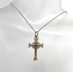 Very Unusual and Beautiful Design of the Cross The cross measures 28x17x2mm plus the top loop and weighs 3.5 grams. The rolo chain is 16" long and it is stamped 925 on the spring ring clasp The cross is not stamped but it tested as silver. Hallmarked White Gold Cross Pendant, Hallmarked White Gold Cross Necklace, Hallmarked White Gold Cross Jewelry And Charms, Silver Cross Necklace, Wedding Jewellery Necklace, Rolo Chain, Silver Cross, The Cross, Wedding Necklace