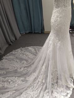 a wedding dress on display at a bridal shop