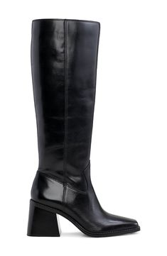 A contemporary square toe and flared block heel balance a versatile boot that will flawlessly complement your polished wardrobe. 2 1/2" heel 15 1/2" shaft; 16 1/2" calf circumference Leather upper/synthetic lining and sole Made in Brazil Polished Wardrobe, Wide Calf, Vince Camuto, Knee High Boots, Riding Boots, Knee High, Heeled Boots, Block Heels, Brazil