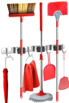 a red and silver rack with brooms, rakes, and other cleaning supplies