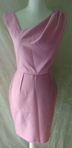 This Is A New With Tag Dress Size 4 The Brand Is Twenty8twelve London The Dress Is Called Ester Tag Of $315.00. Polyester And Viscose Pink Soft. It Is 16" From Arm Pit To Arm Pit And Is 36" From Shoulder To Hem. Beautiful Evening Dress Special Occasion. Side Zip. I Do Consider All Offers. It Is Wrinkled From Storage. Thank You. Chic Sheath Mini Dress For Semi-formal Occasions, Pink Knee-length Semi-formal Dress, Formal Lined Sleeveless Mini Dress, Semi-formal Sheath Mini Dress For Spring, Feminine Pink Sleeveless Dress For Formal Occasion, Pink Sleeveless Dress For Work, Elegant Pink Fitted Sleeveless Dress, Elegant Pink Pleated Mini Dress, Feminine Pink Semi-formal Dress