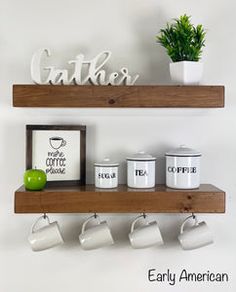 two wooden shelves with coffee mugs on them