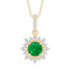 Product Details If youre searching for the perfect jewelry to wear on an evening date with your partner, look no further than this Emerald Pendant. Featuring a 6 MM Round Shape Emerald in a Prong Setting, with Gold Beaded Details and a Round Diamond Halo, this pendant necklace is simply stunning. The subtle yet elegant design is sure to garner you loads of compliments when you wear it. With a total weight of 1.75 Carats and AAA Quality, this pendant is made with high-quality certified gemstones that undergo strict quality checks. Product Information SKU SHP-PENDANT032215272 Weight 2.96 gm (Approximate) EMERALD INFORMATION No.of Stones 1 Pieces Total Weight 0.82 Carat (Approximate) Dimension(approx) Round-6X6 mm-1 Pcs Color Green Cut Brilliant Shape Round Setting Type Prong-Setting Quality Emerald Necklace With Diamond Round Pendant, Gold Emerald Round Pendant Jewelry, Fine Jewelry Green Emerald Round Pendant Necklace, Green Emerald Round Pendant Jewelry, Emerald Round Pendant Jewelry With Gemstone, Round Diamond Halo, Emerald Halo, Halo Pendant, Emerald Pendant