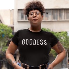 Made From Premium Cotton, It Has A Relaxed Fit With Goddess Statement Printed On It. Enjoy Superior Quality And Comfort With This Stylish Teeshirt. Fitted Black Slogan Shirt, Black Fitted Slogan Shirt, Fitted Black Slogan T-shirt, Comfy Tees, Top Tee, Colorful Shirts, Tee Shirts, Short Sleeves, Relaxed Fit