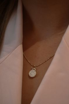 This exquisite bite-sized 'mini' locket with pavé diamonds, a deliciously decadent keepsake to hold a treasured photo or a small token of affection. Just like with classic DEVON WOODHILL lockets, it opens to reveal a small compartment, providing a safe and secure place to hold a cherished photo or a tiny memento. Its compact size and delicate chain make it a versatile accessory, perfect for everyday wear or to be layered with other necklaces for a personalized look. Diamond Medallion Necklace With Charms, Diamond Charm Medallion Necklaces, Diamond Charms Medallion Necklace, Diamond White Jewelry With Detachable Pendant, Diamond White Jewelry With Detachable Pendant As Gift, Elegant Diamond Locket Jewelry, White Gold Medallion With Pave Setting, White Gold Medallion Jewelry With Pave Setting, White Gold Pave Setting Medallion Jewelry