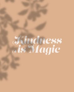 the words kindness is magic are shown in white letters on a beige background with leaves