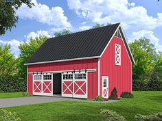 a large red barn with two doors and windows