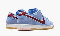 The Nike SB Dunk Low “Phillies” is a colorway of the venerable skate shoe that shows love to the Philadelphia Phillies, specifically the baseball team’s throwback uniforms from the 1980s.  From the Nike SB Dunk’s “Bubble Gum Pack” of baseball-inspired colorways, the “Phillies” debuted in July 2022 and features a light blue and red color blocking that draws favorably from the Phillies’ powder blue team uniforms worn by the ballclub back in the day.  Specifically, Valour Blue nubuck appears on the Sb Dunks Outfit, Gum Pack, Philly Cheese Steak Sandwich, Cheese Steak Sandwich, Philadelphia Eagles Football, Cheese Steak, Philly Cheese, Steak Sandwich, Maroon Leather