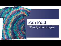 a tie dye t - shirt with the words fan fold on it and an image of a