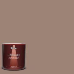 a red paint can with the words marjoiee on it in front of an orange background