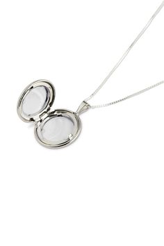 Elegant and and timeless our Classic Locket is a forever piece for the modern sentimental. Featuring a round, slightly convex locket that has a shiny finish hanging from a 1mm 20" Box Chain. 20" Box Chain Stearling silver Classic Locket Necklace With Adjustable Chain As Gift, Elegant Round Locket Necklace With Adjustable Chain, Sterling Silver Keepsake Locket Necklace With Round Pendant, Sterling Silver Keepsake Locket Necklace, Sterling Silver Locket Necklace For Keepsake, White Gold Medallion Locket Necklace As Gift, Silver Oval Locket Necklace With Adjustable Chain, White Gold Locket Necklace With Round Pendant, Classic Locket Necklace With Round Pendant And Adjustable Chain