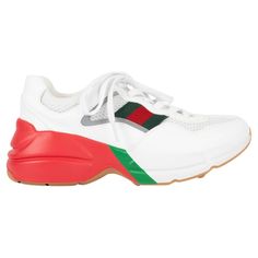 100% authentic Gucci Rython sneakers in white leather and mesh with classic web-stripe in green & red on the side. The design features a chunky white, red and green rubber sole and is lined in white terry cloth. Brand new. Come with dust bags. 2021 Resort Epilogue Collection Measurements Imprinted Size 36.5 Shoe Size 36.5 Inside Sole 23.5cm (9.2in) Width 7.5cm (2.9in) Heel 4cm (1.6in) All our listings include only the listed item unless otherwise specified in the description above Gucci Sporty Sneakers For Streetwear, Gucci Sports Sneakers With Rubber Sole, Gucci Sneakers With Rubber Sole For Sports, Gucci Sneakers With Perforations For Streetwear, Gucci Perforated Sneakers For Streetwear, Gucci Green Sneakers With Rubber Sole, Gucci High-top Sneakers With Red Sole, Gucci White Sneakers For Streetwear, Green Sporty Sneakers With Red Sole