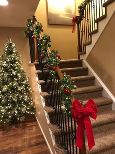 christmas decorations on the banisters and stairs