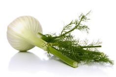 an onion and some herbs on a white background with words describing the benefits of garlic