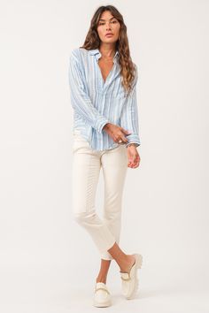 image of a female model wearing a LOLA OVERSIZED SHIRT BLUE STREAK DEAR JOHN DENIM Blue Long Sleeve Shirt With Rolled Sleeves, Spring White Shirt With Striped Cuffs, White Shirt With Striped Cuffs For Spring, Blue Blouse With Striped Collar In Relaxed Fit, Blue Blouse With Striped Collar And Relaxed Fit, Spring Blue Shirt With Striped Cuffs, Blue Shirt With Striped Cuffs For Spring, Summer Long Sleeve Tops With Striped Cuffs, Summer Tops With Striped Cuffs And Long Sleeves