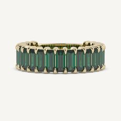 Denny features a striking ¾ Lab-grown Zambian Emerald baguette band with shared prongs and flat shank. Emerald Cut Wedding Band, Antique Gemstone Rings, Baguette Band, Emerald Wedding Band, Ring Cuts, Sapphire Wedding Band, Jewelry Education, Trending Engagement Rings, Ring Trends