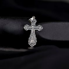 This elegant and meaningful men's pendant features a finely crafted crucifix design in gleaming sterling silver. The pendant showcases a traditional Christian cross with meticulous attention to detail, including a raised figure of Jesus Christ. The silver has a polished finish that adds to its overall luster and sophistication.   The crucifix pendant is designed with a masculine touch, making it a perfect accessory for men of faith who want to wear a symbol of their beliefs with style and grace. The pendant is sized to be noticeable yet not overpowering, making it suitable for both everyday wear and special occasions. * Product Details * * Material: High Quality Solid 925 Sterling Silver. * Finish : Gold, Silver, Oxidized. Gold : 14K Gold Plated Sterling Silver. Silver : 14K White Gold Pla Spiritual Polished Cross Jewelry And Charms, Classic Sterling Silver Cross Charm, Silver Crucifix Necklace With Polished Finish, Classic Engraved Crucifix Cross Necklace, Classic Silver Crucifix Jewelry, Silver Crucifix Cross Necklace For Anniversary, Sterling Silver Cross For Anniversary, Sterling Silver Cross Charms For Anniversary, Sterling Silver Cross Jewelry For Anniversary