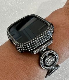 Apple Watch Series 9 41mm or 45mm same size as Series 7/8 (use that selection) and 49mm Ultra 1 (use that selection) or 2 same size.  Fits the Apple Watch 49mm Ultra Series 8.   Luxury Custom Black Rhodium Plated Watch band sparkling pave Swarovski Crystals, 2 circles on each side with removable links on the back & or Apple Watch Cover studded with Swarovski Crystals set in a metallic black poly carbonate hard frame.  There is no screen protector.   So pretty and elegant, photos don't capture th Apple Watch Cover, Elegant Photos, Ultra Series, Ceramic Watch, Apple Watch Case, Apple Watch Accessories, Black Rhodium, Apple Watch Band, Lab Diamonds