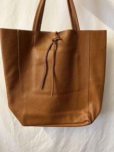 NEW High Class  Dark Tan (Brown) Women's Genuine Leather Bag, Leather Tote Bag, Gift Bag, Shoulder Bag Tried to show right colour in photos Approximate dimension size: L(TOP):41CM L(BOTTOM):28CM H:37CM W:13CM, The Handle approximately: 29 cm, Inner Pocket approximately: Length:16cm; Height:16cm At £60 Please add me to your favourite seller list Please check my shop which consist of the different fabrics such as wool, silk, jacquard, fabulous, exquisite fabrics, scarves and bags Will NOT take res Dark Tan Leather Bag For On-the-go, Brown Bag With Large Capacity For On-the-go, Brown Tote-shaped Bucket Bag For Daily Use, Brown Tote Bucket Bag For Daily Use, Brown Bucket Tote Bag For Daily Use, Cognac Textured Leather Bag For On-the-go, Brown Bucket Bag With Removable Pouch For Shopping, Brown Double Handle Shoulder Bag For On-the-go, Brown Shoulder Bag For Shopping