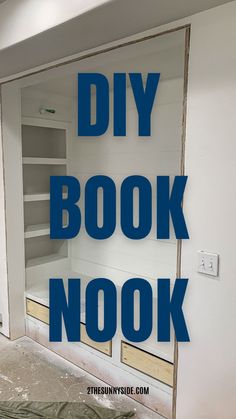 an empty room with the words diy book nook in blue overlays