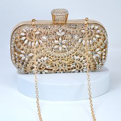 New to our Millennium collection, This beautiful romantic Silver Gold Crystal Floral Leaves bridal clutch bag is made of very fine quality of crystal,  rhinestones, fabric and metal and it comes with Chain 46 inches long os cross body bag Detachable chain for your Big day! The Clutch measure about 7.5 inches long, 4 inches wide and thickness of the bag is 1.8 inches  ► ABOUT YOUR ORDER * All items are neatly packaged in our beautiful jewelry boxes and elegant organza bags. * All items are 100% gift-ready. * Each order comes with a personalized handwritten card and a branded Millennium Bride jewelry cloth. * Each order comes with a free gift. ► PERSONALIZTION * If your order is a gift, you may contact us with the recipient's name or a message, and we'll print a personalized card that will b Gold Clutch Bag For Evening, Elegant Wedding Evening Bag With Openable Detail, Elegant Openable Evening Bag For Wedding, Elegant Wedding Evening Bag, Elegant Gold Clutch For Wedding, Rectangular Clutch For Wedding, Glamorous Handheld Clutch For Wedding, Gold Rectangular Evening Bag For Wedding, Elegant Gold Handheld Bag