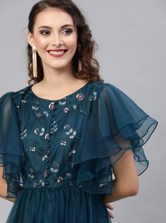 The embellished woven maxi dress, has a round neck, short sleeves, an attached lining, and flared hemMaterial: Net With LiningSizes: To Fit Bust(in inches): XS(32), S(34), M(36), L(38), XL(40), 2XL(42)To Fit Waist(in inches): XS(28), S(30), M(32), L(34), XL(36), 2XL(38)Pattern: Floral Embroidered, SequinStyle: Indian Dress, Indo Western Dress, Wedding Wear, Indian Gown, Anarkali Dress, Anarkali GownOccasion: Party/FestiveWash Care: Dry CleanDispatch within 7 days Festive Ruffled Maxi Dress, Festive Maxi Dress With Ruffles, Festive Ruffle Dress With Cape Sleeves, Festive Dresses With Ruffles And Cape Sleeves, Spring Festive Dress With Cape Sleeves, Summer Dresses With Floral Embroidery And Cape Sleeves, Festive Summer Dress With Cape Sleeves, Evening Maxi Dress With Sequins And Short Sleeves, Party Maxi Dress With Ruffles And Short Sleeves