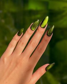 Metallic Olive Green Nails, Green And Gold Toenails, Dark Fall Nail Art, Long Almond Nails Green, Jewel Tone Nails Acrylic, Shimmery Green Nails, Green Jewel Nails, Artist Nails Design, Short Olive Green Nails Designs