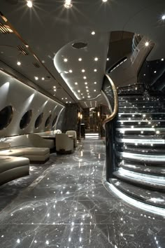 the interior of an airplane with stairs and seating