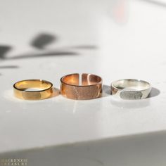 "♥ Actual Fingerprint Ring is the most unique and personal jewelry you can ever find. ------ D E T A I L S ------ * Material: High Quality Solid Sterling Silver 925 (safe for sensitive skin). * Band width: 7 mm OR 4 mm (adjustable) * Finish: Sterling Silver ∙ Yellow Gold Plated ∙ Rose Gold Plated * Handcrafted with Love and Care ♥ Our 18k gold plated jewelry is much thicker than other gold plating, resulting in a durable, long-lasting product. ------ H O W ∙ T O ∙ O R D E R ------ + Simply take Finger Print Jewelry, Fingerprint Rings Wedding, Fingerprint Ring Gold, Fingerprint Pendant, Thumbprint Jewelry, Dual Birthstone Ring, Fingerprint Ring, Memorial Ring, Custom Wedding Band