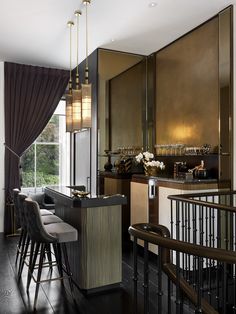 an elegant bar with stools and barstools