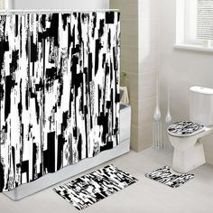 a bathroom with black and white designs on the shower curtain, toilet seat covers and rugs