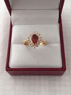 Free Shipping on orders over $35.00 however if there is a return buyer to refund seller for the free shipping cost to seller. Rare 18K Gold 0.75ct Rhodocrosite Gemstone Pear Cut 16 Accent Diamonds Solid 750 Yellow Gold Ring Stunning Beautiful 18K Gold Hallmarked 18K Ring size - 5.75 Visit our shops on Etsy HauteCoutureLaLa TrendsCouture BeautifulPatina LastingTrendsFree Shipping on orders over $35.00 however if there is a return buyer to refund seller for the free shipping cost to seller. Free S Retro Ring, Yellow Gold Bracelet, Wave Design, Dec 12, Gorgeous Bracelet, Yellow Gold Ring, Photo Bracelet, Pear Cut, Cultured Pearls