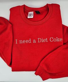 I need a Diet Coke Trendy Sweatshirt, Embroidered Sweatshirt, Cute Sweatshirt, For Her.  Fun gift. Customize your shirt.  Put the wording in the personalization box.  be sure you are ordering the option you want. There are T-shirts, Crewnecks or hoodies.  We offer a variety of custom made embroidery apparel.  Check out the Christmas Cats! https://kikileeoriginals.etsy.com/listing/1582529187 See photos above for sizing.  The primary color is the shirt color.  Visit the rest of our shop at KikiLee Casual Crew Top With Machine Embroidery, College Red Tops With Embroidered Text, Casual Short Sleeve Sweatshirt With Embroidered Text, Red College Tops With Embroidered Text, Red College Top With Embroidered Text, Red Embroidered Text College Tops, Casual Short Sleeve Sweatshirt With Custom Embroidery, College Long Sleeve T-shirt With Machine Embroidery, Red Crew Neck Top With Embroidered Text