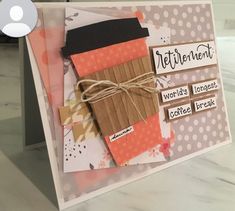 a close up of a card with some type of paper on it and tags around the edges