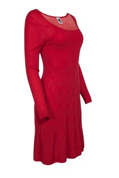 Embrace timeless luxury with a classic Missoni knit dress. Crafted from a soft wool blend in bright red, this playfully textured masterpiece transcends seasons and trends. Style it with strappy sandals for spring, or rock some tall leather boots for a chic autumn ensemble. Size 6 (IT 42) Self 54% Virgin Wool, 46% Viscose Lining 100% Polyester Pullover Long sleeve Scoop neckline Ruffled skirt Textured knit w/ slight stretch Bust 29" Waist 26" Shoulder to hem 39" Sleeve length 25" Elegant Pointelle Knit Sweater Dress For Winter, Elegant Red Sweater Dress For Fall, Elegant Red Sweater Dress For Party, Chic Red Fitted Sweater Dress, Elegant Fitted Textured Knit Sweater Dress, Elegant Fitted Pointelle Knit Sweater Dress, Red Sweater Dress For Spring Party, Elegant Winter Pointelle Knit Dresses, Elegant Red Knee-length Sweater Dress