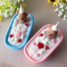 two soap trays with teddy bears in them