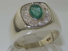 *This gorgeous ring is made from 925 Sterling Silver with Natural Emerald & Diamond. Stylish Simple High Quality Gents signet ring, hand set with a 7x5mm (0.48x0.40 inches) oval shaped Natural Emerald Stone complimented by sixteen Diamonds weighing a total of 0.16ct. The Quality of this piece is Superb, the ring has a smooth polished finish and a good solid shank which shows that this is a quality design and is also good for comfort and durability. Large Rare Genuine Natural Emerald gemstone and Mens Signet Ring, Signet Ring Men, Natural Emerald, Emerald Diamond, Real Diamonds, Yellow Rose, Signet Ring, Pink Tourmaline, Diamond Gemstone