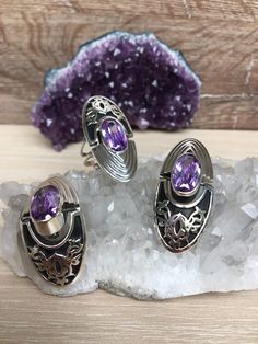 Armenian ornament ring and earrings in high quality sterling silver 925. The set is combined with purple zircons. Besides that stones we can make this set with any natural stones and minerals, also with another color of zircon. For the same model with red zircon, click here: https://etsy.me/2MDovFj For natural labradorite, click here: https://etsy.me/38iT0sl For natural variscite, click here: https://etsy.me/3nkk5jl For natural lapis lazuli, click here: https://etsy.me/3rXQMGC For custom one, cl Fine Jewelry Amethyst Ring In Sterling Silver Oval Shape, Handmade Oval Amethyst Ring In Sterling Silver, Oval Amethyst Ring In Sterling Silver, Oval Amethyst Ring With Stone Setting In Sterling Silver, Handmade Elegant Oval Amethyst Ring, Oval Amethyst Ring With Sterling Silver Setting, Elegant Handmade Oval Amethyst Ring, Handmade Purple Oval Jewelry, Unique Silver Oval Amethyst Ring