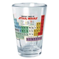 a shot glass with an image of the elements of star wars on it's side