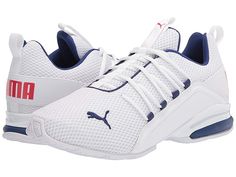 PUMA Axelion - Men's Running Shoes : Puma White-elektro Blue : fabric-and-synthetic 100% Synthetic Viet Nam Machine Wash Low-profile non-marking rubber indoor outsole. Suitable for use on any indoor surface Exagerrated supportive lacing system Weight of footwear is based on a single item, not a pair. Cricket Shoes For Men, Cricket Shoes, Puma Running Shoes, Shoes Puma, Puma White, Puma Cat, Nike Shox, Workout Session, Cat Logo