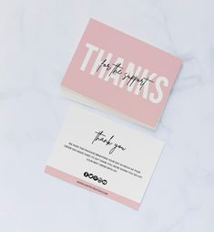 two business cards with the words thanks written on them