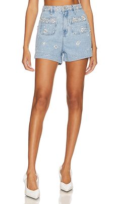 Find PATBO Hand-beaded Shorts In -light on Editorialist. PatBO Hand-Beaded Shorts in Denim-Light. - size 2 (also in 4, 8) PatBO Hand-Beaded Shorts in Denim-Light. - size 2 (also in 4, 8) 100% cotton. Made in Brazil. Hand wash. Zip fly with button closure. Front slip pockets. Denim fabric with faux pearl, bead and crystal embellishments throughout. Item not sold as set. Shorts measure approx 13.5 in length. PBTO-WF23. SHO25541US. PatBO is a Brazilian brand that captures the vibrant energy of Sout Casual Embellished Shorts For Spring, Casual Embellished Jean Shorts For Spring, Embellished Shorts For Spring, Casual Embellished Denim Bottoms, Casual Embellished Summer Bottoms, Casual Embellished Bottoms For Summer, Embellished Medium Wash Denim Bottoms, Embellished Cotton Bottoms For Summer, Summer Embellished Cotton Jeans