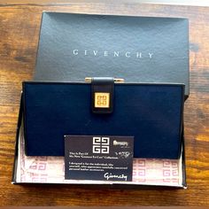 Rare Givenchy Vintage Kisslock Long Wallet New W/ Full Inclusion-Original Box/Card/Tissue Deep Blue Jacquard Logo Print Made In Spain Gold Kisslock Compartment W/Leather Interior Full Leather Compartment W/6 Card Slots & 2 Large Compartments Gold Hardware-Snap Givenchy Logo Closure, Both Snaps Very Strong This Piece Is Stunning & Flawless-Pristine Original Box Shows A Little Wear Card Included Add A Gold Chair And Wear As A Crossbody! (Chain Not Included) Priority Shipping Designer Clutch With Original Box For Formal Occasions, Classic Clutch For Formal Occasions, Designer Bifold Clutch For Evening, Designer Formal Rectangular Wallets, Designer Formal Wallets With Rectangular Case, Designer Rectangular Wallets For Formal Occasions, Designer Evening Wallets With Magnetic Closure, Givenchy Wallet, Gold Chair