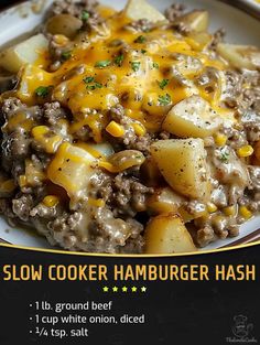 a plate with potatoes, meat and cheese on it next to a sign that says slow cooker hamburger hashbrown